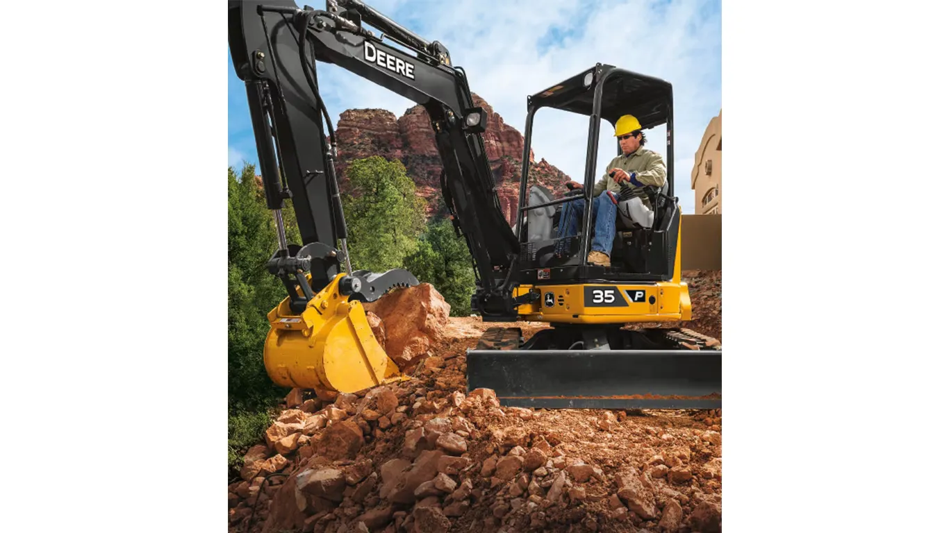John Deere 35P mini excavator working with its bucket and thumb